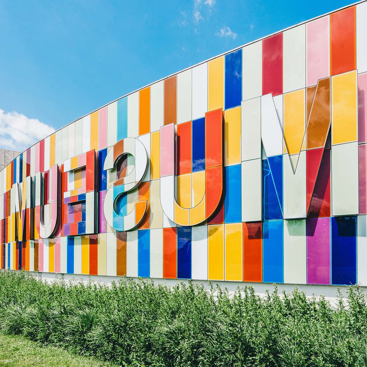 kitchener photo of Museum signage near green leafed plants canada